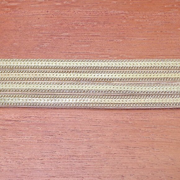 Wide gold chain bracelet with four rows of chain backed with a soft suede. - Picture 4 of 12